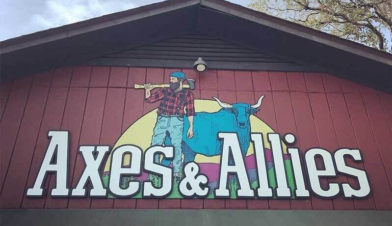 Front entrance of Axes and Allies axe-throwing venue in downtown Wilmington